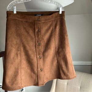 Brown faux suede skirt front buttons size 12, above the knee not too short